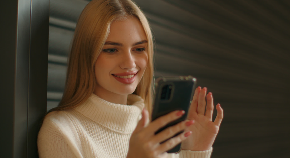 Client booking an appointment on her phone